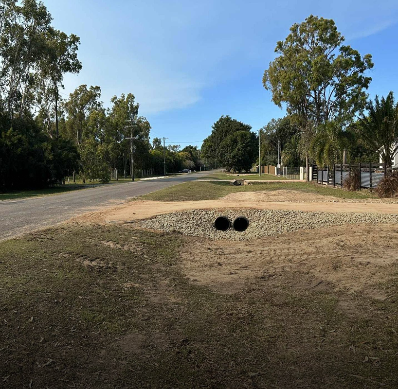 Rural road with drainage pipes