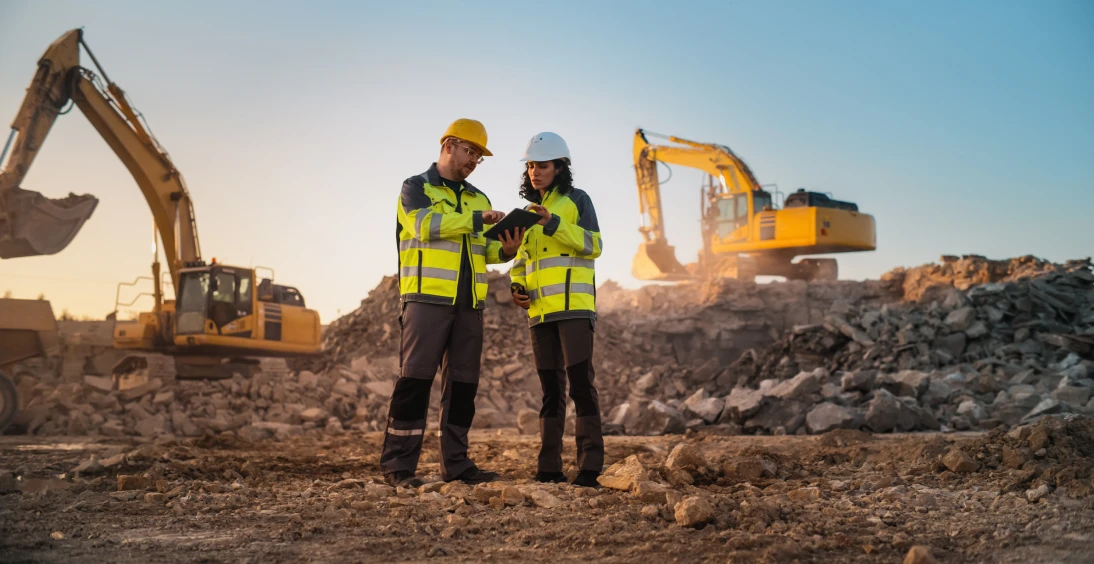Excavators operating at a construction area